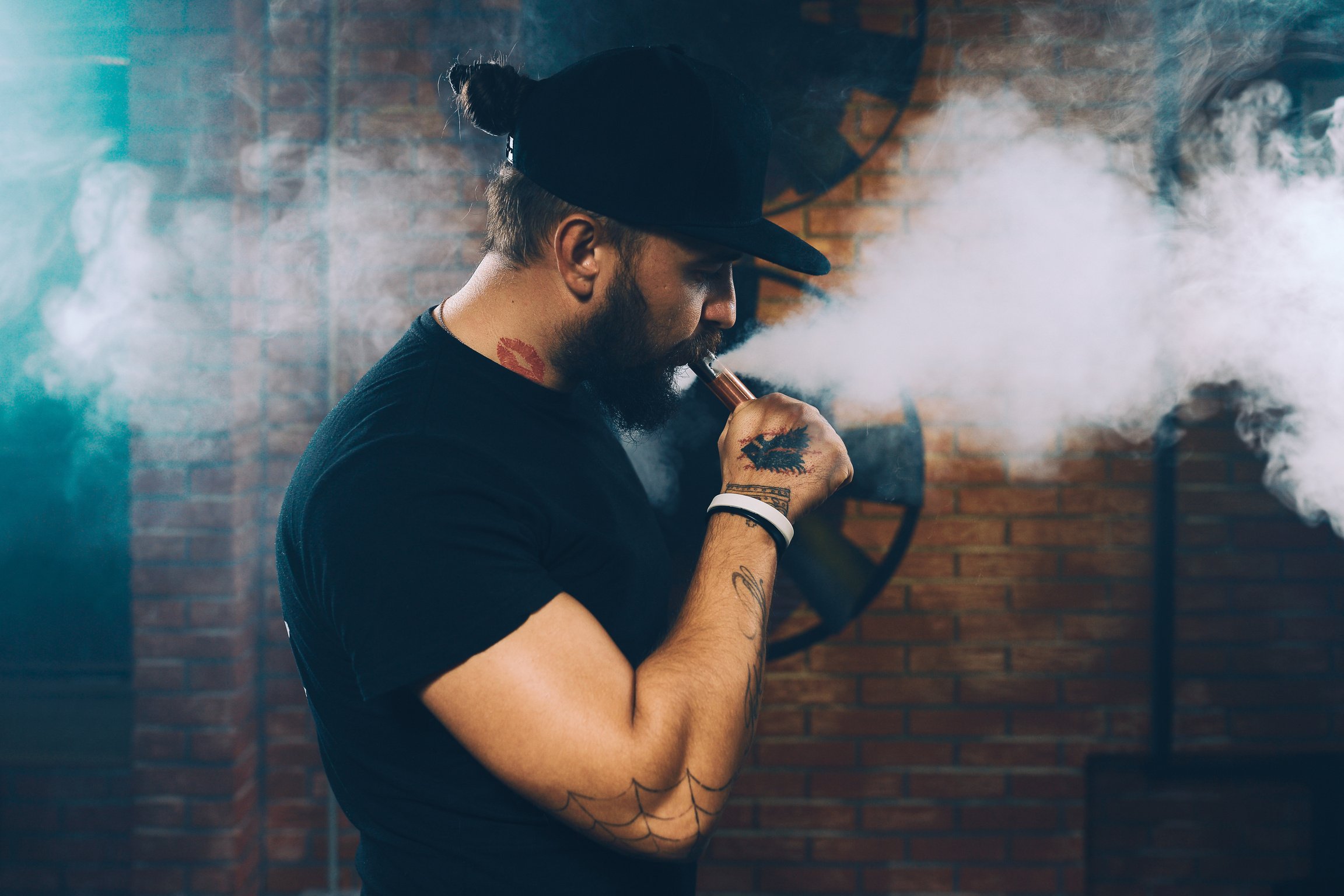 Man vaping an electronic cigarette